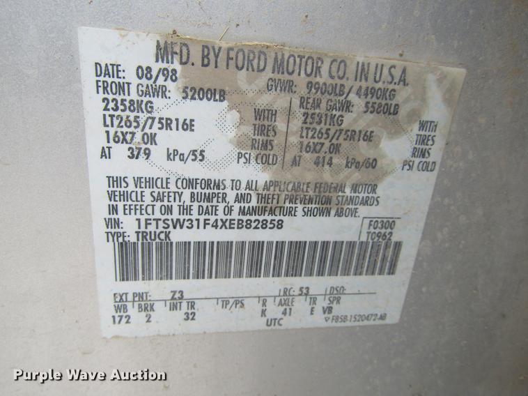 image for item DD5753 1999 Ford F350 Super Duty XLT Crew Cab bale bed pickup truck