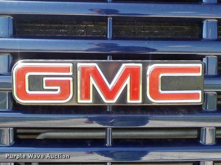 image for item DD7174 2004 GMC C4500 flat dump bed truck