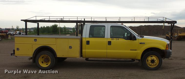 image for item DV9309 1999 Ford F450 Super Duty Crew Cab utility truck