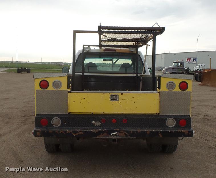 image for item DV9309 1999 Ford F450 Super Duty Crew Cab utility truck