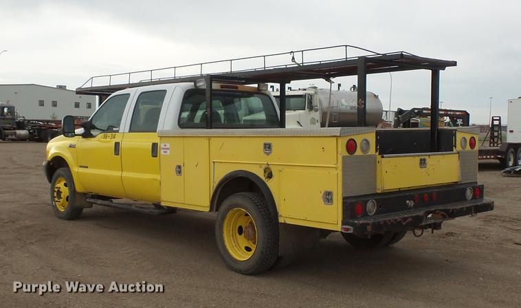 image for item DV9309 1999 Ford F450 Super Duty Crew Cab utility truck