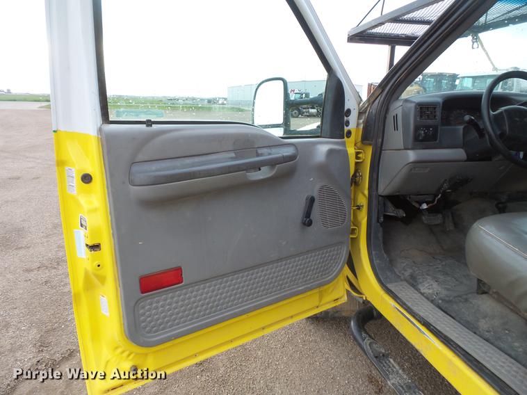 image for item DV9309 1999 Ford F450 Super Duty Crew Cab utility truck