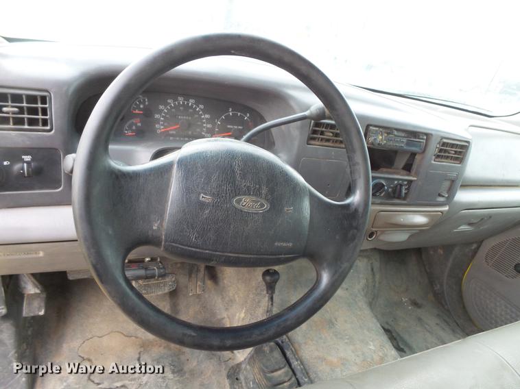 image for item DV9309 1999 Ford F450 Super Duty Crew Cab utility truck