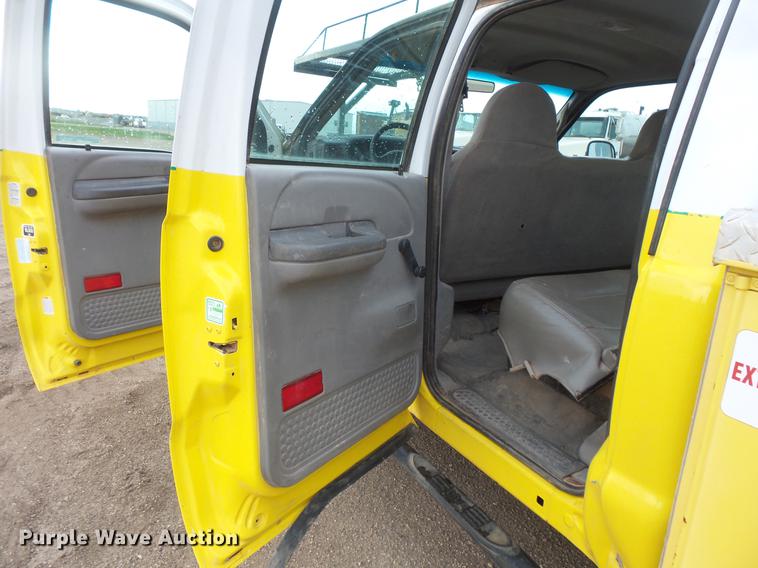 image for item DV9309 1999 Ford F450 Super Duty Crew Cab utility truck