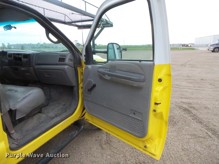 image for item DV9309 1999 Ford F450 Super Duty Crew Cab utility truck