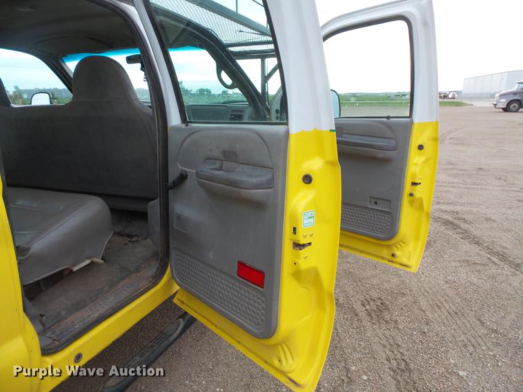 image for item DV9309 1999 Ford F450 Super Duty Crew Cab utility truck