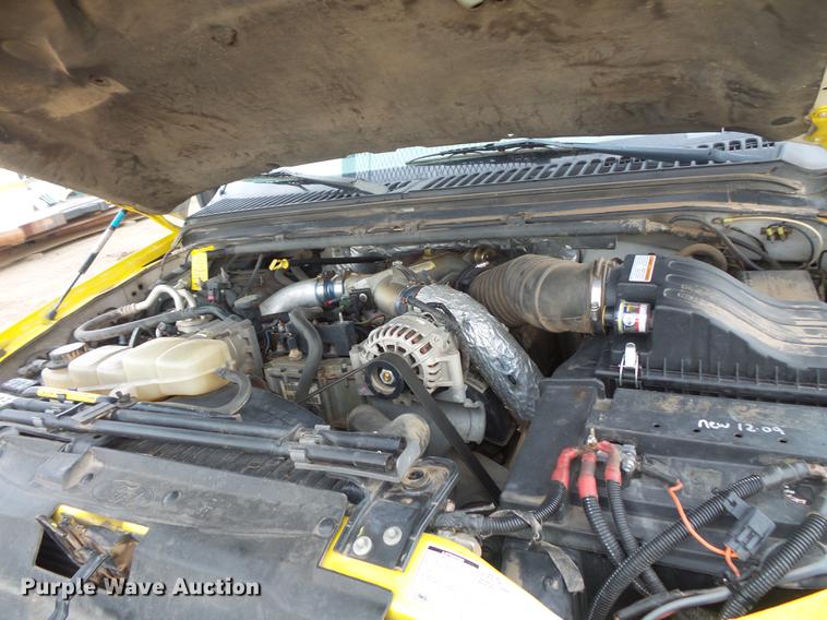 image for item DV9309 1999 Ford F450 Super Duty Crew Cab utility truck