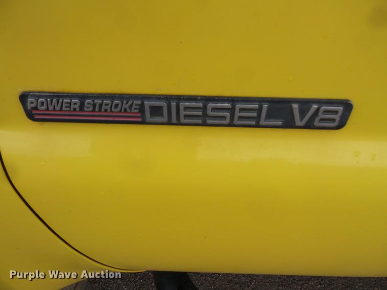 image for item DV9309 1999 Ford F450 Super Duty Crew Cab utility truck