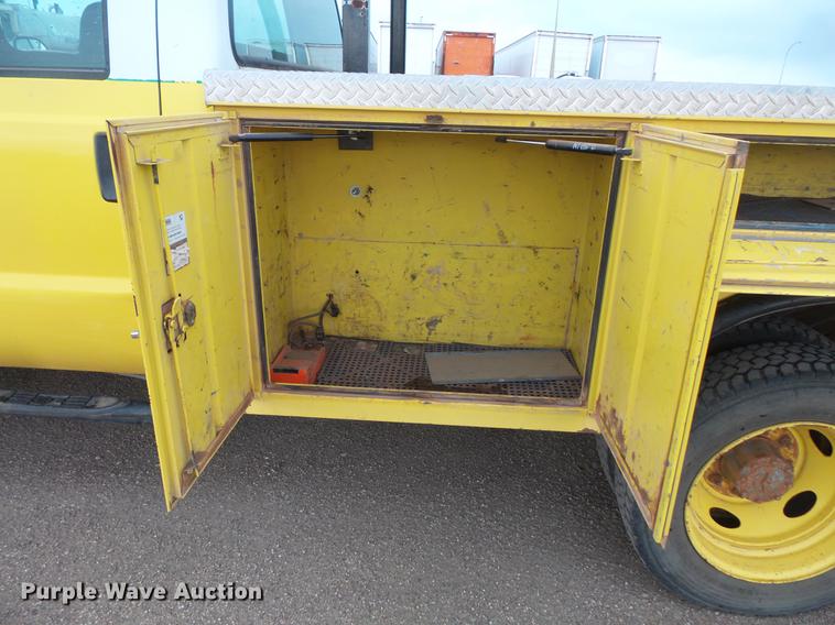 image for item DV9309 1999 Ford F450 Super Duty Crew Cab utility truck