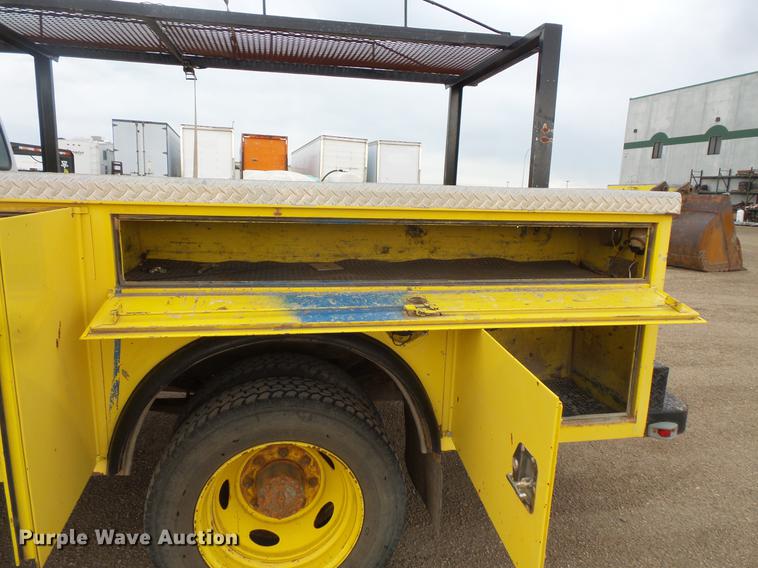 image for item DV9309 1999 Ford F450 Super Duty Crew Cab utility truck