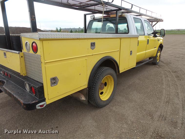 image for item DV9309 1999 Ford F450 Super Duty Crew Cab utility truck