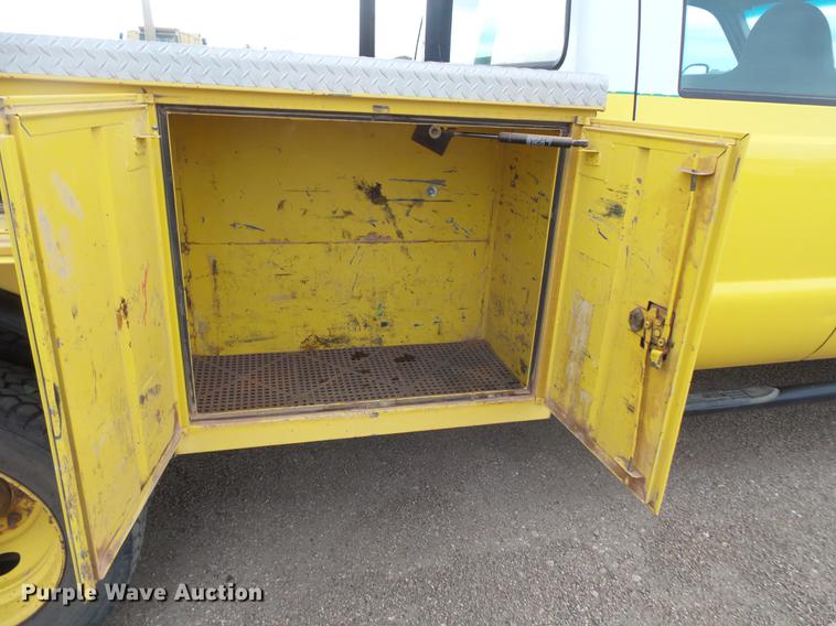 image for item DV9309 1999 Ford F450 Super Duty Crew Cab utility truck