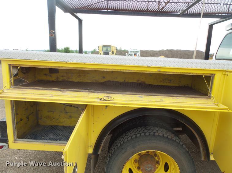 image for item DV9309 1999 Ford F450 Super Duty Crew Cab utility truck