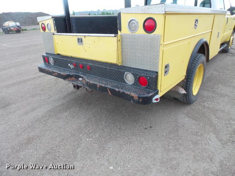 image for item DV9309 1999 Ford F450 Super Duty Crew Cab utility truck