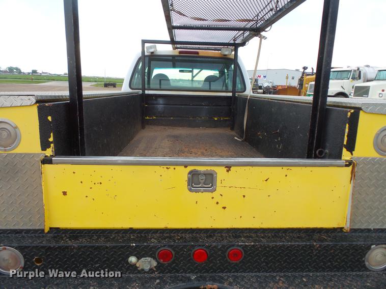 image for item DV9309 1999 Ford F450 Super Duty Crew Cab utility truck