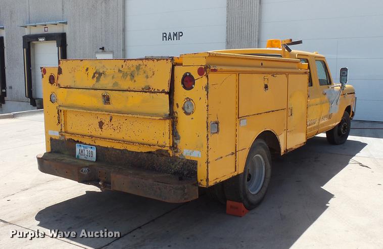 image for item DV9334 1979 Ford F350 Crew Cab utility bed pickup truck