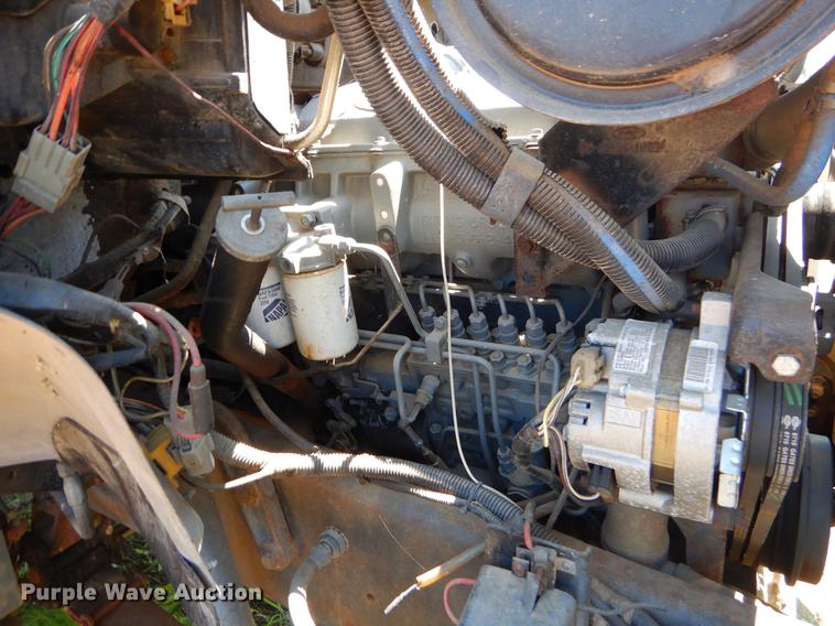 image for item EI9207 1991 Ford F800 flatbed truck with crane