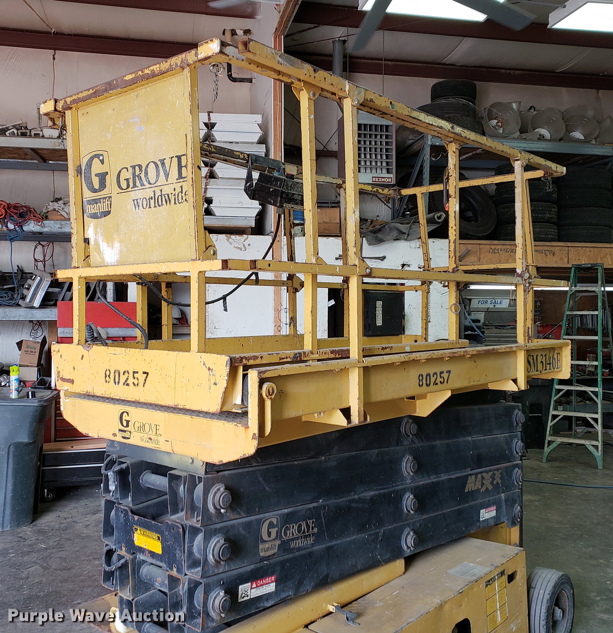 1995 Grove SM3146E scissor lift in Grain Valley, MO Item EP9444 sold Purple Wave