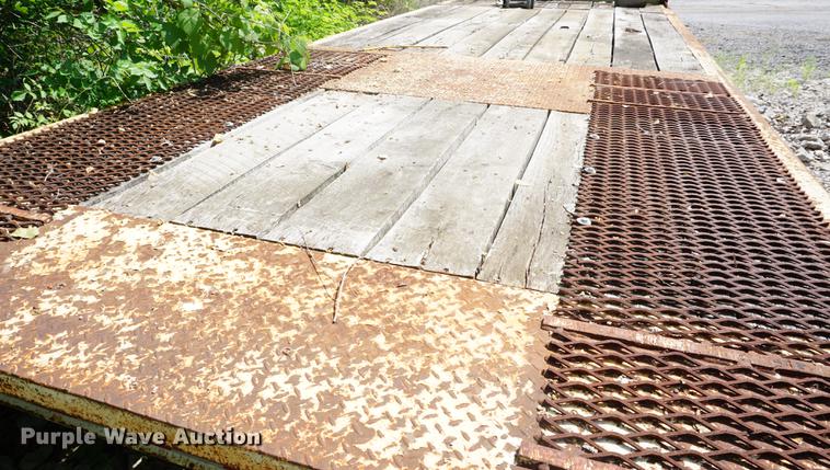 image for item DB6017 2003 Overbuilt tilt deck equipment trailer