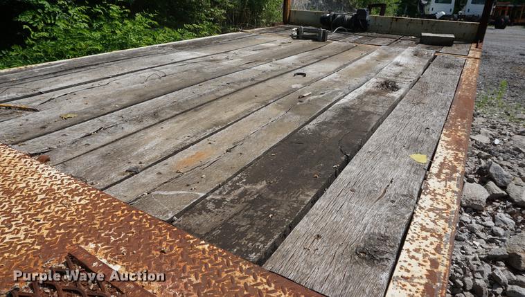 image for item DB6017 2003 Overbuilt tilt deck equipment trailer