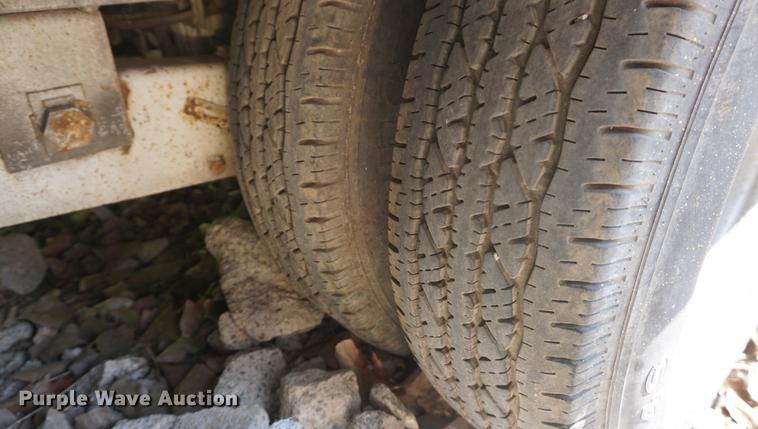 image for item DB6017 2003 Overbuilt tilt deck equipment trailer