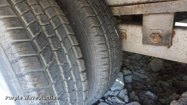 image for item DB6017 2003 Overbuilt tilt deck equipment trailer