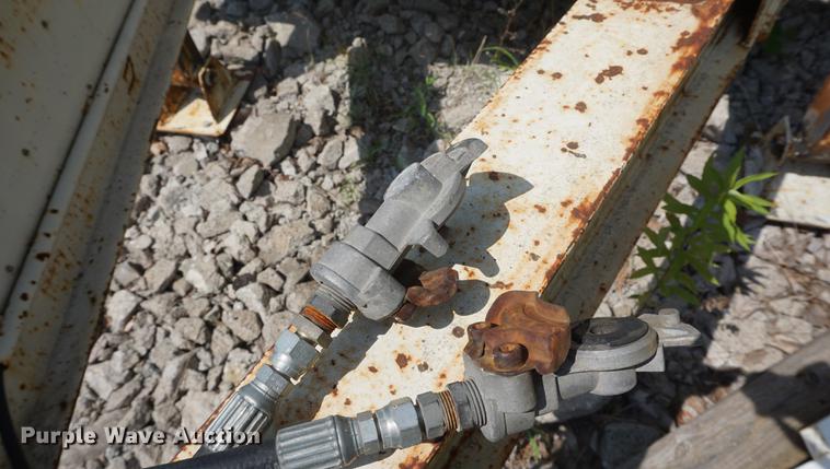 image for item DB6017 2003 Overbuilt tilt deck equipment trailer