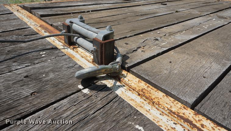 image for item DB6017 2003 Overbuilt tilt deck equipment trailer