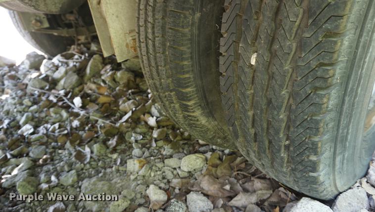 image for item DB6017 2003 Overbuilt tilt deck equipment trailer