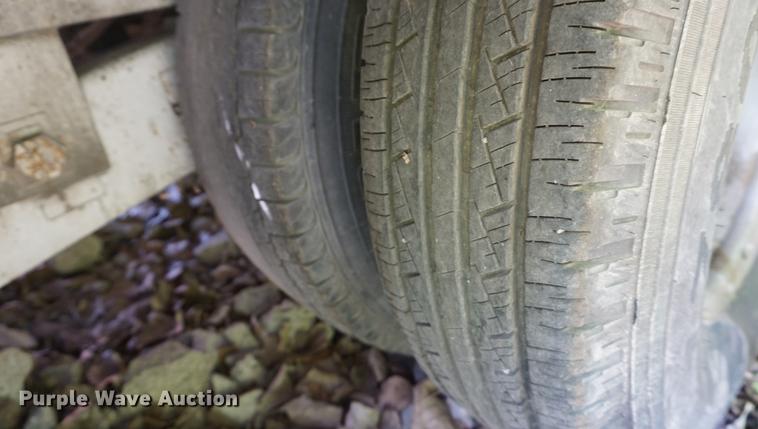 image for item DB6017 2003 Overbuilt tilt deck equipment trailer