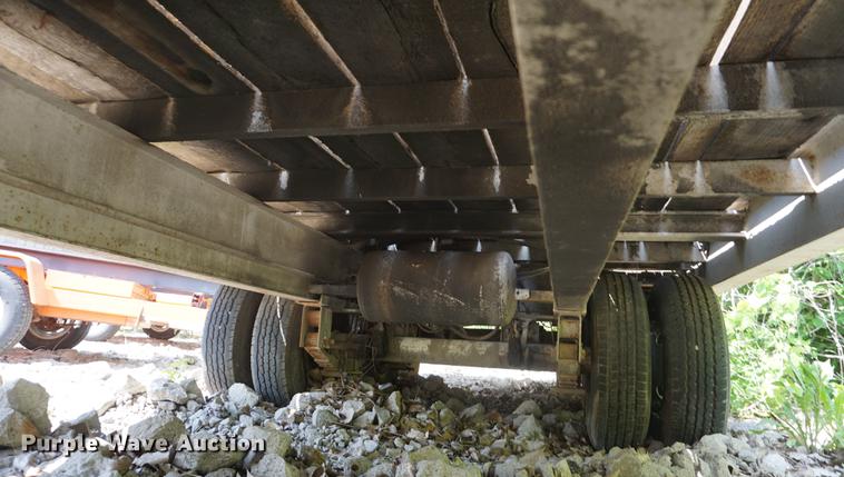 image for item DB6017 2003 Overbuilt tilt deck equipment trailer