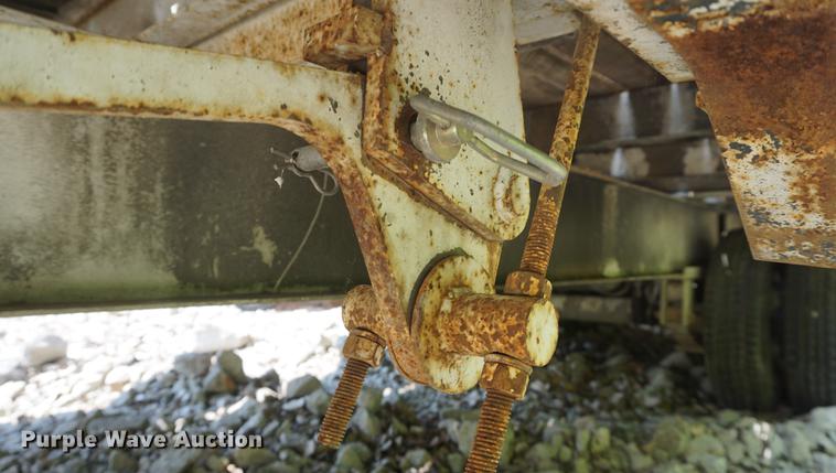 image for item DB6017 2003 Overbuilt tilt deck equipment trailer