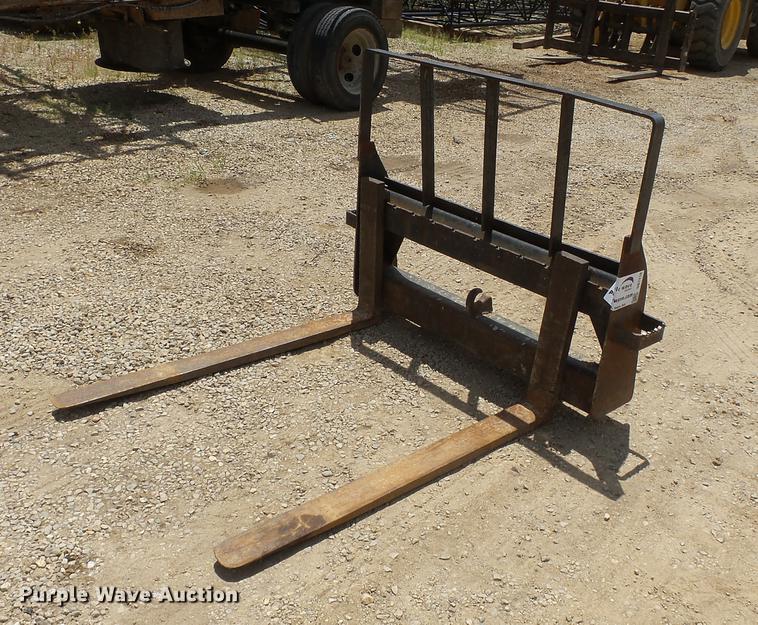 image for item DB7110 John Deere skid steer pallet forks