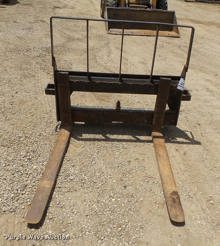 image for item DB7110 John Deere skid steer pallet forks