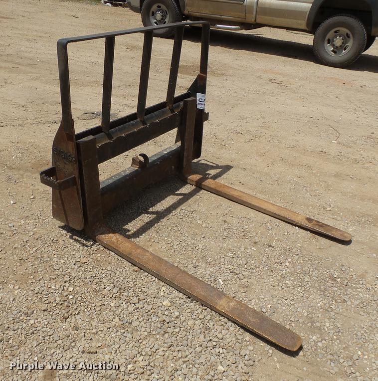 image for item DB7110 John Deere skid steer pallet forks