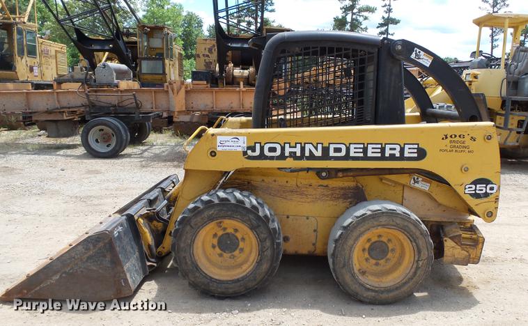 image for item DB7111 1999 John Deere 250 skid steer