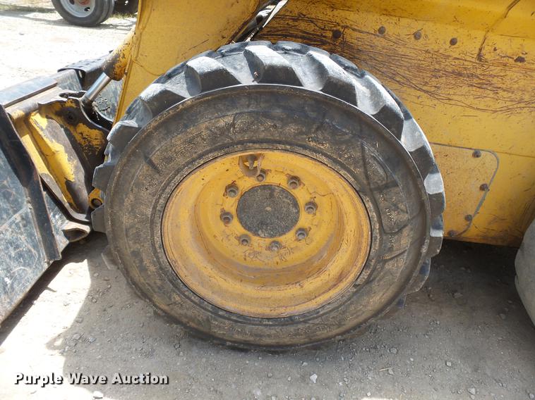 image for item DB7111 1999 John Deere 250 skid steer