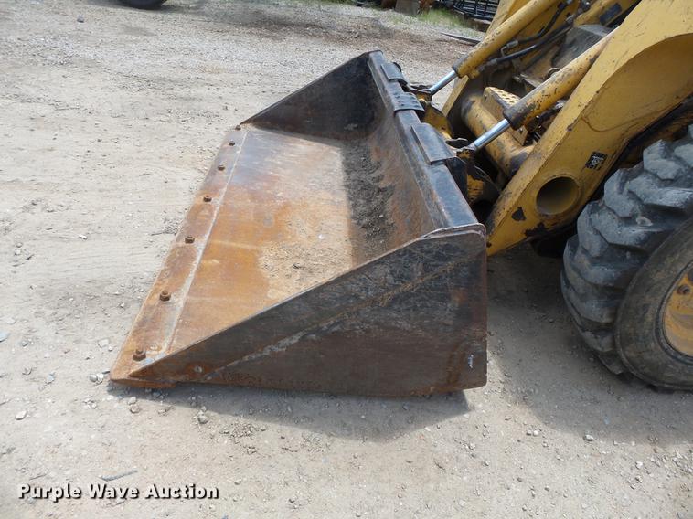 image for item DB7111 1999 John Deere 250 skid steer