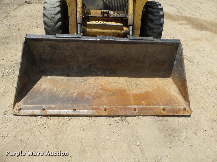 image for item DB7111 1999 John Deere 250 skid steer
