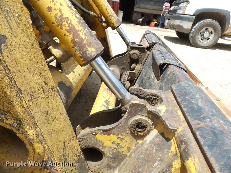 image for item DB7111 1999 John Deere 250 skid steer