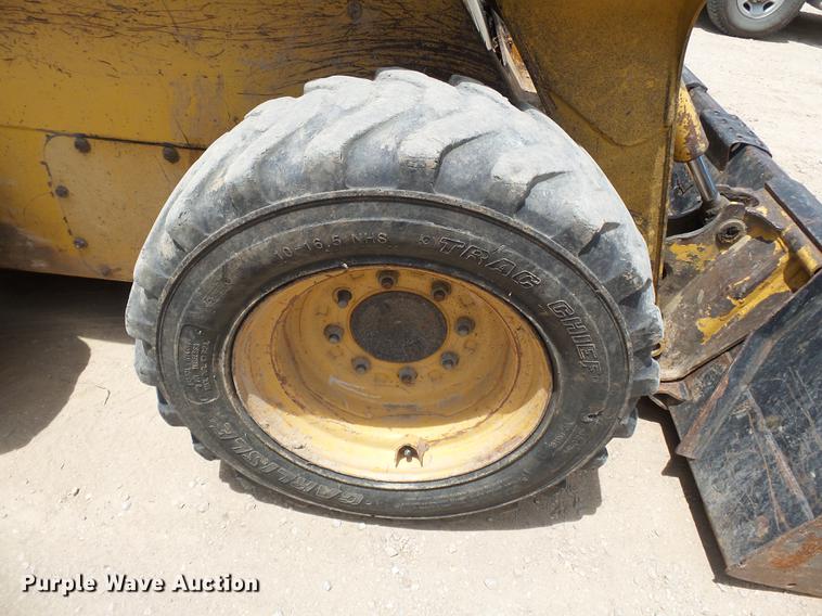 image for item DB7111 1999 John Deere 250 skid steer