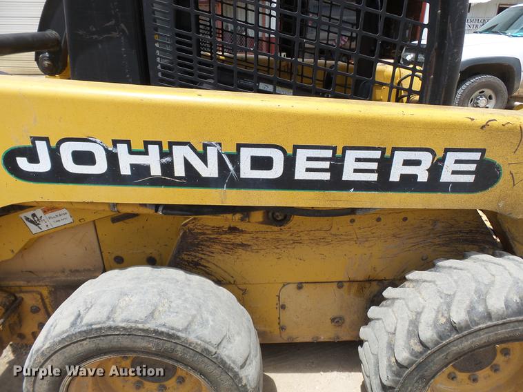 image for item DB7111 1999 John Deere 250 skid steer