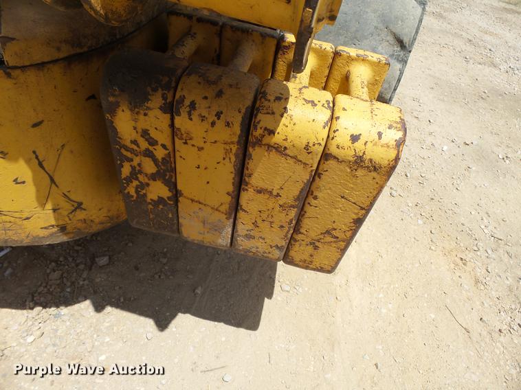 image for item DB7111 1999 John Deere 250 skid steer