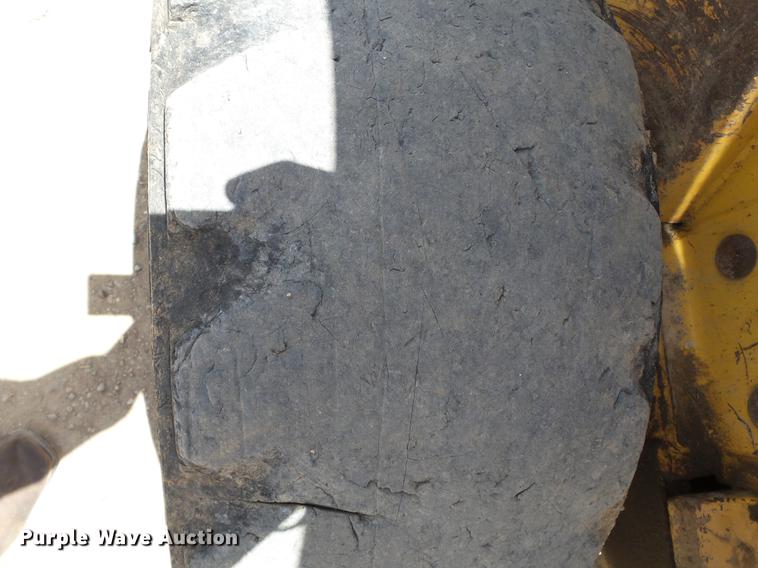 image for item DB7111 1999 John Deere 250 skid steer