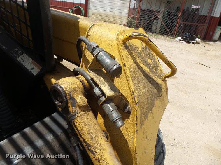 image for item DB7111 1999 John Deere 250 skid steer