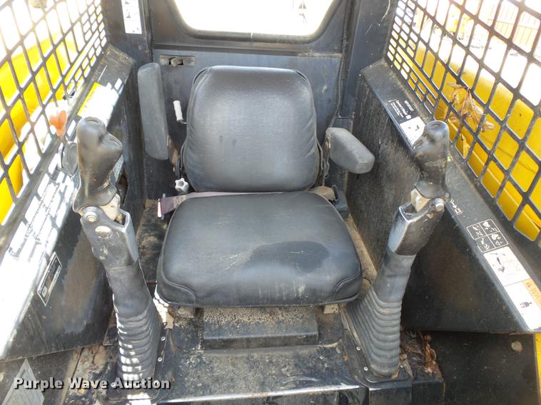 image for item DB7111 1999 John Deere 250 skid steer