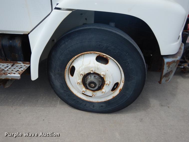 image for item DB8481 2002 Freightliner FL60 flatbed truck