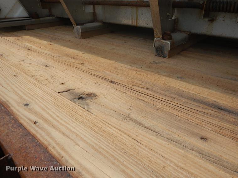 image for item DB8481 2002 Freightliner FL60 flatbed truck