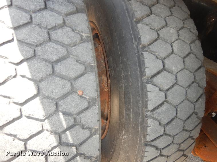 image for item DB8481 2002 Freightliner FL60 flatbed truck