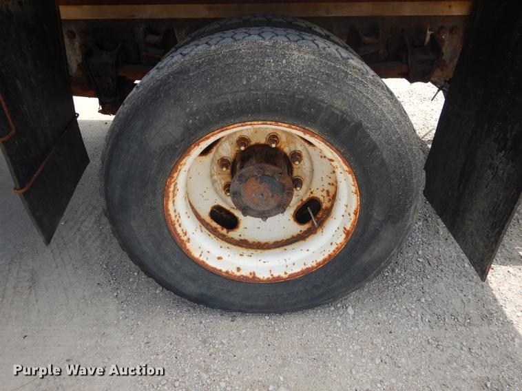 image for item DB8481 2002 Freightliner FL60 flatbed truck